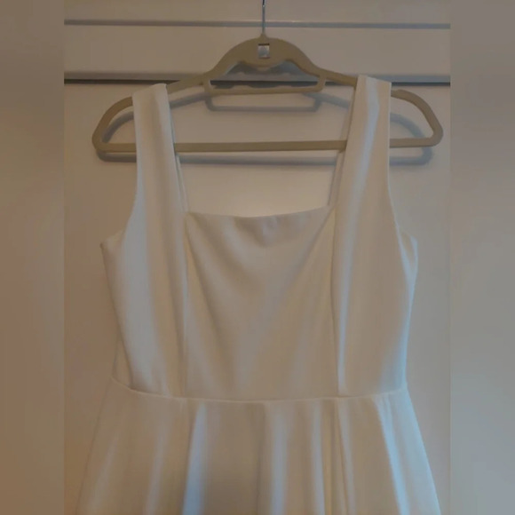 LuLu's Ivory white ponte knit Stretch Fit & Flare high low dress. M - Picture 2 of 9